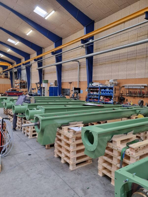 Heavy-duty screw conveyors in beginning of the assembly process