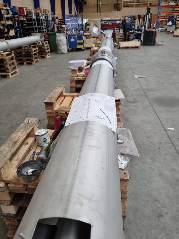 Tube conveyors for flake ice during assembly
