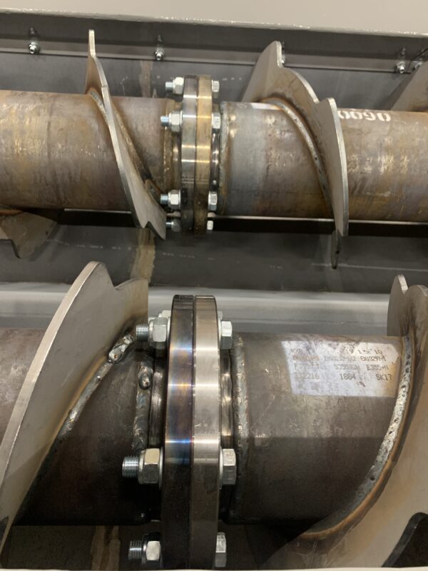 Screw conveyor double assembly of screw augers