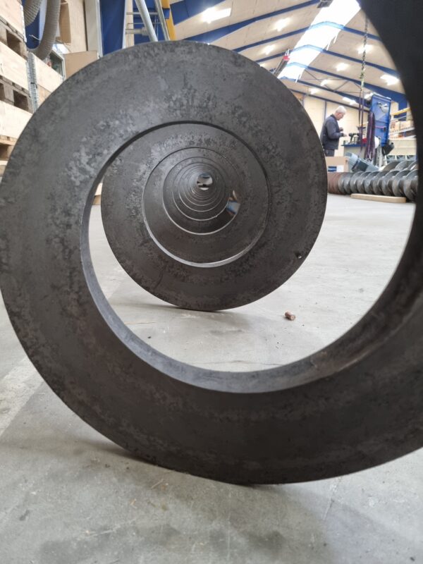 Shaftless rotor in cabon steel